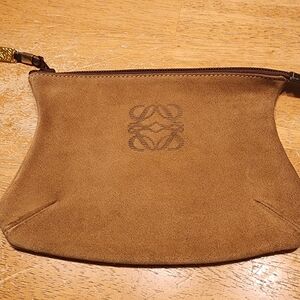 vintage brown suede Loewe Anagram pouch features the brand's iconic anagram logo